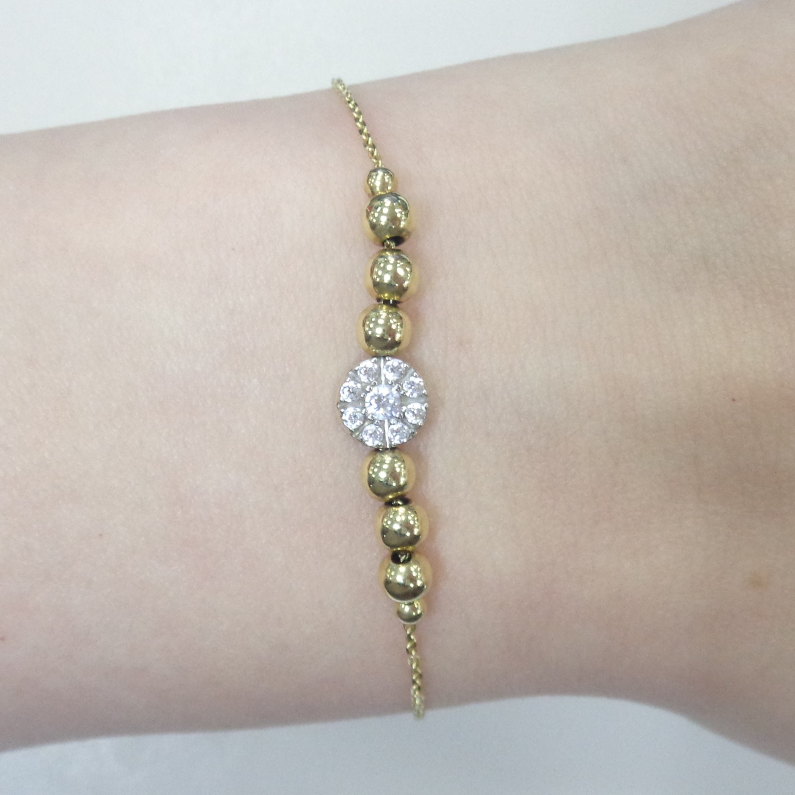 Золотой браслет 585 пробы; желтое золото; плетение Якорное; родий; вставки 9 Фианит бесцв.;